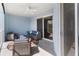 Relaxing covered patio with comfortable seating and ceiling fan at 3 Riverwalk Dr # 202, New Smyrna Beach, FL 32169