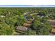 Scenic aerial view showcasing a home surrounded by lush greenery in a tranquil residential community at 30 Reflections Village Dr, Ormond Beach, FL 32174