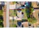 Aerial view of a single-story home shows the property line and surrounding neighborhood at 3107 Mapleshade St, Deltona, FL 32738