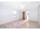 Bright and airy bedroom with hardwood floors, ceiling fan and closet at 3107 Mapleshade St, Deltona, FL 32738