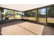 Enclosed screened patio overlooking a spacious yard at 3107 Mapleshade St, Deltona, FL 32738