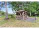 Outdoor gazebo surrounded by lush greenery, ideal for relaxing or entertaining guests at 313 Dirksen Dr # A5, Debary, FL 32713