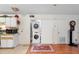 A stacked washer and dryer is in its own closet, inside the kitchen at 313 Dirksen Dr # A5, Debary, FL 32713