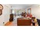 Cozy living room with wood floors and sliding door access to the patio at 313 Dirksen Dr # A5, Debary, FL 32713
