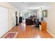Spacious living room features wood floors and ample natural light at 313 Dirksen Dr # A5, Debary, FL 32713