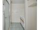 Standard bathroom includes a shower, vanity with a sink, and tile flooring at 313 Dirksen Dr # B15, Debary, FL 32713