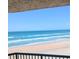 Breathtaking ocean views from the condo balcony with blue water and a sandy beach at 3311 S Atlantic Ave # 604, Daytona Beach Shores, FL 32118