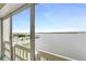 Balcony view of the water, pool and surrounding landscape at 3606 S Peninsula Dr # 507, Port Orange, FL 32127