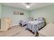 Inviting guest bedroom with two twin beds and modern decor at 3606 S Peninsula Dr # 507, Port Orange, FL 32127