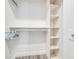 Walk-in closet with built-in shelving and ample storage space at 3606 S Peninsula Dr # 507, Port Orange, FL 32127