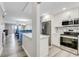 Modern kitchen featuring stainless steel appliances, white cabinets, and stylish countertop at 3606 S Peninsula Dr # 507, Port Orange, FL 32127