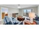 Comfortable living room featuring a fireplace, and a sliding glass door to the balcony at 3606 S Peninsula Dr # 507, Port Orange, FL 32127