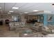 Community lounge area with ping pong and pool table plus comfortable seating at 3606 S Peninsula Dr # 507, Port Orange, FL 32127
