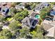 Aerial view of home, showcasing the backyard pool and mature trees surrounding the property at 3698 Lower Park Rd, Orlando, FL 32814