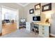 Bright home office with a desk and built-in storage, offering a great workspace at 3698 Lower Park Rd, Orlando, FL 32814