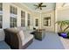 Relaxing outdoor patio with comfortable seating, stylish decor, and an inviting ambiance at 3698 Lower Park Rd, Orlando, FL 32814