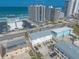 Aerial view of the building showing parking, nearby buildings, and street view at 3733 Cardinal Blvd # 1, Daytona Beach, FL 32118