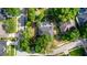 Enjoy an aerial view of the home nestled among mature trees in a peaceful neighborhood at 397 Quail Hill Dr, Debary, FL 32713