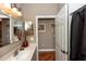 Inviting bathroom featuring a vanity with a sink, and open doorway to hallway at 397 Quail Hill Dr, Debary, FL 32713