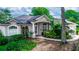 Charming single-story home with beautiful landscaping and a welcoming front entrance at 397 Quail Hill Dr, Debary, FL 32713