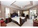 Spacious main bedroom with ceiling fan and sliding door to patio at 397 Quail Hill Dr, Debary, FL 32713