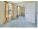 Bedroom with sliding mirror closet doors, neutral walls and carpet plus one window with natural light at 416 N Blue Lake Ter, Deland, FL 32724