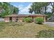 Charming single-story home with well-maintained landscaping in a quiet residential neighborhood at 416 N Blue Lake Ter, Deland, FL 32724