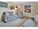 Bright and airy living room with lots of light, featuring stylish decor, and comfortable seating arrangements at 416 N Blue Lake Ter, Deland, FL 32724