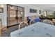 Sunroom with casual dining and seating area offers views to the backyard and pool at 416 N Blue Lake Ter, Deland, FL 32724