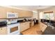 Bright kitchen features modern appliances, a breakfast bar, and ample cabinet space at 470 Foxhill Dr, Debary, FL 32713