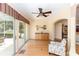 Inviting living area with sliding glass doors and a ceiling fan at 470 Foxhill Dr, Debary, FL 32713