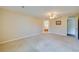 Neutral-toned bedroom featuring a ceiling fan and natural light through a window at 5463 Carmody Lake Dr, Port Orange, FL 32128