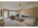 Comfortable living room with a cozy fireplace and neutral decor at 5463 Carmody Lake Dr, Port Orange, FL 32128