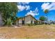 Residential home with an attached garage, showcasing its well-kept exterior and ample driveway space at 5788 Devon St, Port Orange, FL 32127