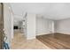Inviting living room with tile and hardwood floors, leading to a cozy fireplace at 5788 Devon St, Port Orange, FL 32127
