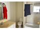 Modest bathroom featuring a vanity, toilet, and bathtub, ready for personalized updates at 580 Ronnoc Ln, New Smyrna Beach, FL 32168