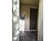 Townhouse entry with brick pavers and large front door at 6043 Strada Isle Way, Orlando, FL 32835