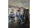 Community gym featuring various workout machines and large windows at 6043 Strada Isle Way, Orlando, FL 32835