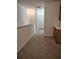 Upstairs hallway with carpeted floor and natural light at 6043 Strada Isle Way, Orlando, FL 32835