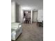 Spacious living area with tile floors, neutral walls, and ample natural light at 6043 Strada Isle Way, Orlando, FL 32835