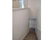 Carpeted staircase leading to lower level at 6043 Strada Isle Way, Orlando, FL 32835