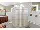 Lovely bathroom with a glass block shower/tub wall and vanity at 6317 Palmas Bay Cir, Port Orange, FL 32127