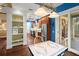 Charming dining area with unique chandelier, and stainless steel appliances in background at 6317 Palmas Bay Cir, Port Orange, FL 32127