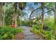 Natural path to a dock surrounded by lush vegetation at 6317 Palmas Bay Cir, Port Orange, FL 32127