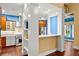 Open concept kitchen with stainless steel appliances, granite counters, and breakfast bar at 6317 Palmas Bay Cir, Port Orange, FL 32127