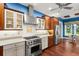 Updated kitchen with stainless appliances, granite countertops, and a gas range at 6317 Palmas Bay Cir, Port Orange, FL 32127