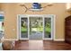 Living room view with sliding doors opening to the backyard, accentuating the seamless indoor-outdoor flow of the property at 6317 Palmas Bay Cir, Port Orange, FL 32127