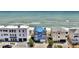 Charming beachfront home with a metal roof, steps from the sand at 6847 S Atlantic Ave, New Smyrna Beach, FL 32169