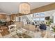 Open concept dining room and kitchen area with views into the living room at 6847 S Atlantic Ave, New Smyrna Beach, FL 32169