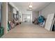 Large garage providing ample storage for beach gear and outdoor equipment, perfect for active lifestyles at 6847 S Atlantic Ave, New Smyrna Beach, FL 32169